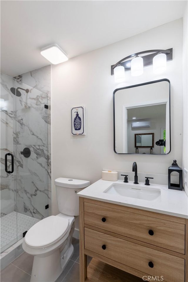 35414 Date Ave, Yucaipa, CA 92399 - bathroom with vanity, a marble finish shower, a wall mounted air conditioner, and tile patterned flooring