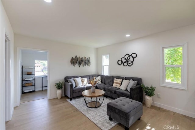 35414 Date Ave, Yucaipa, CA 92399 - living room with healthy amount of natural light, light wood finished floors, and recessed lighting
