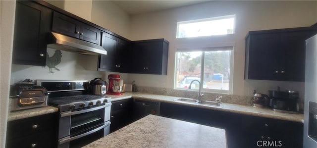 kitchen with dishwasher, sink, and stainless steel gas range