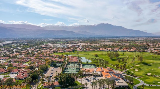 bird's eye view with a water and mountain view