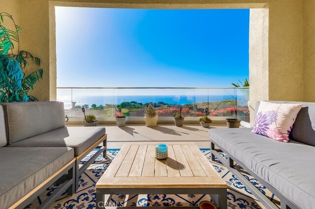 balcony with an outdoor hangout area