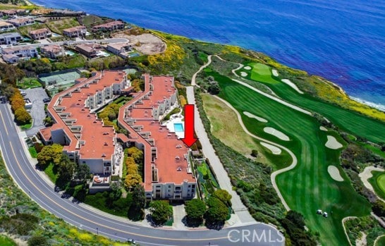 aerial view with a water view and view of golf course