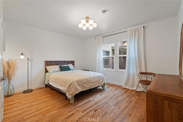 bedroom featuring hardwood / wood-style flooring