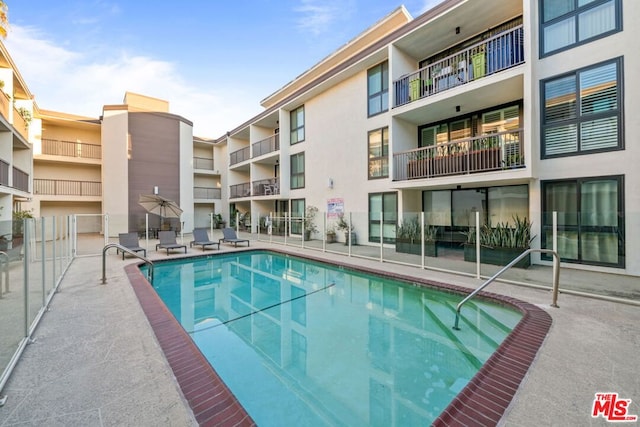 view of pool with a patio area