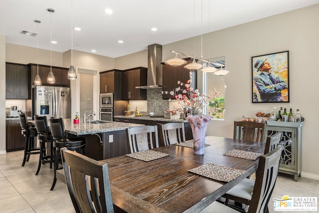 view of tiled dining space