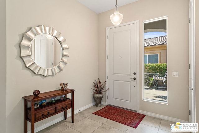 entryway featuring light tile patterned floors