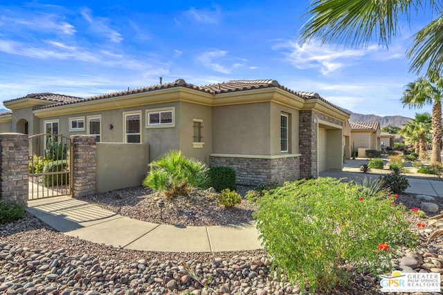 view of property exterior with a garage