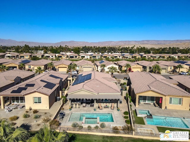 drone / aerial view with a mountain view