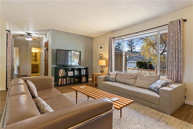 12755 Blue Heron Ct, Clearlake Oaks, CA 95423 - living room featuring hardwood / wood-style floors, ceiling fan, and a textured ceiling