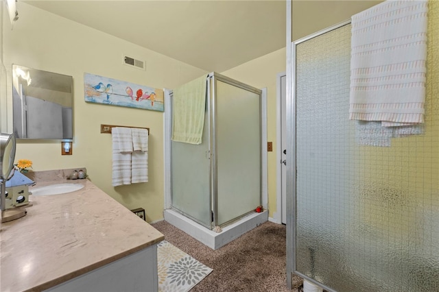 bathroom featuring vanity and walk in shower