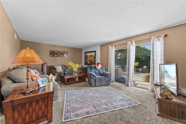 carpeted living room featuring a textured ceiling