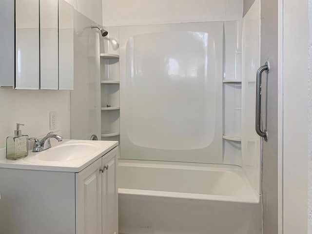 bathroom featuring vanity and bathtub / shower combination