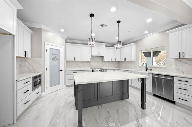 kitchen with light stone counters, stainless steel appliances, a kitchen island, pendant lighting, and white cabinetry