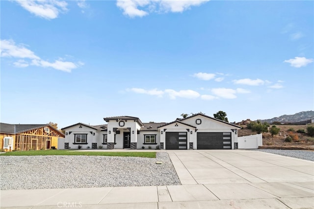 view of front of property with a garage