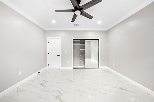 unfurnished bedroom featuring ceiling fan, ornamental molding, and a closet