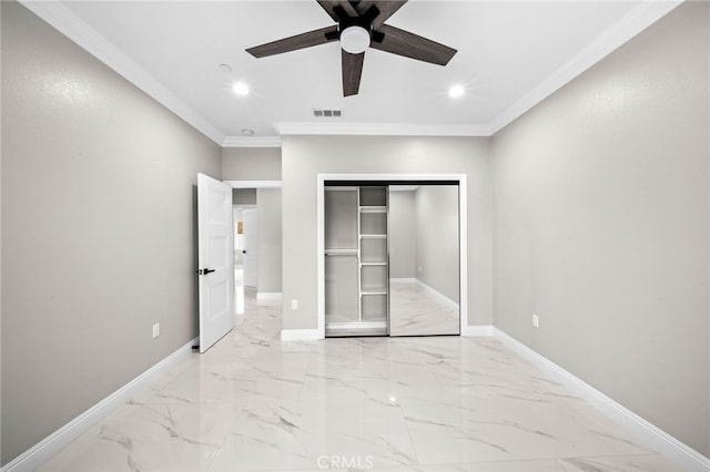 unfurnished bedroom featuring ceiling fan, crown molding, and a closet