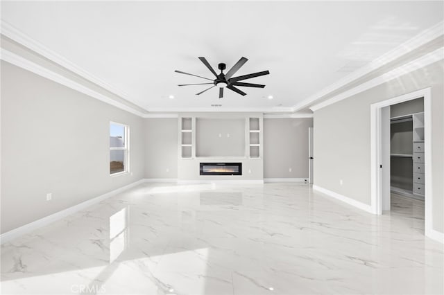 unfurnished living room with built in shelves, ceiling fan, and crown molding