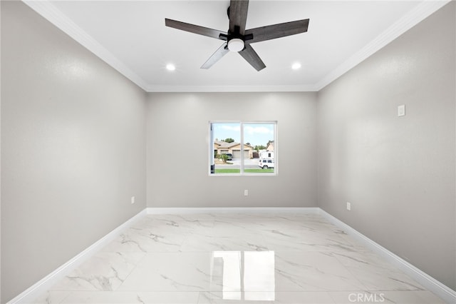 empty room featuring ceiling fan and ornamental molding