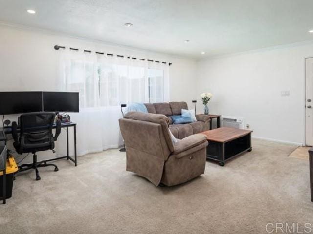 living room featuring recessed lighting, crown molding, and light carpet