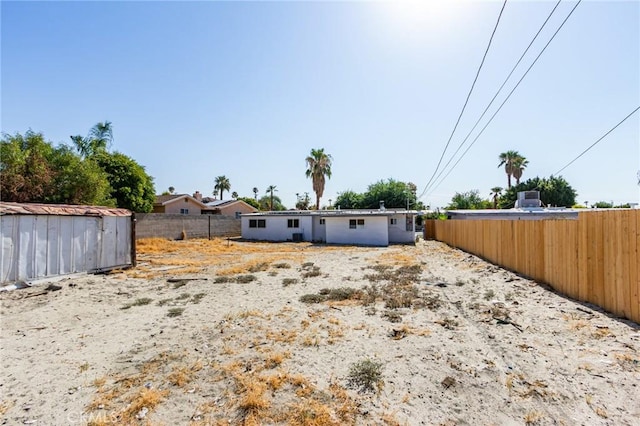 exterior space featuring a storage shed