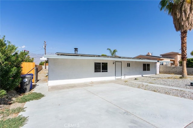 ranch-style house with a patio area