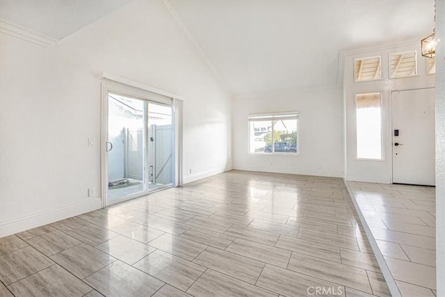 empty room with lofted ceiling