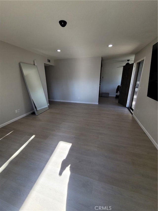 empty room with wood-type flooring