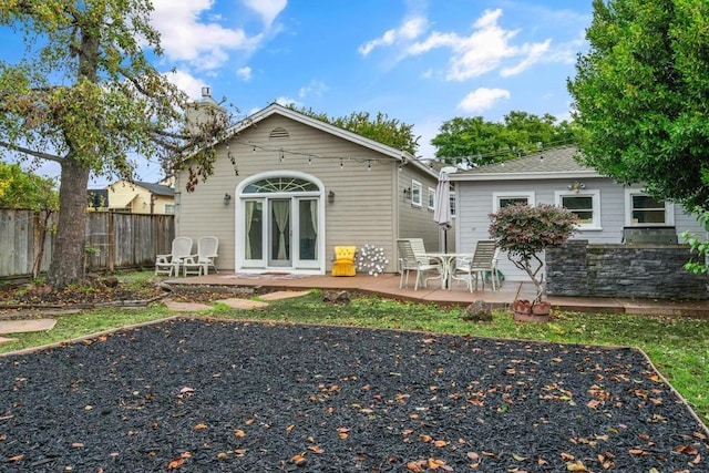 back of property featuring a patio