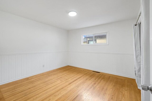 empty room featuring light hardwood / wood-style flooring