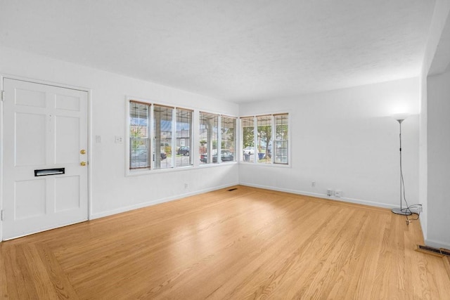 empty room featuring light hardwood / wood-style flooring