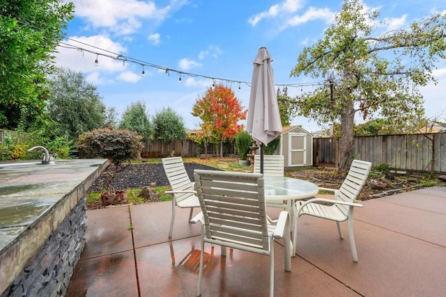 view of patio / terrace with a storage shed