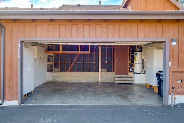 garage featuring water heater