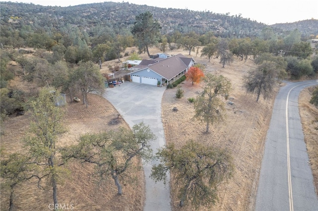 birds eye view of property featuring a rural view