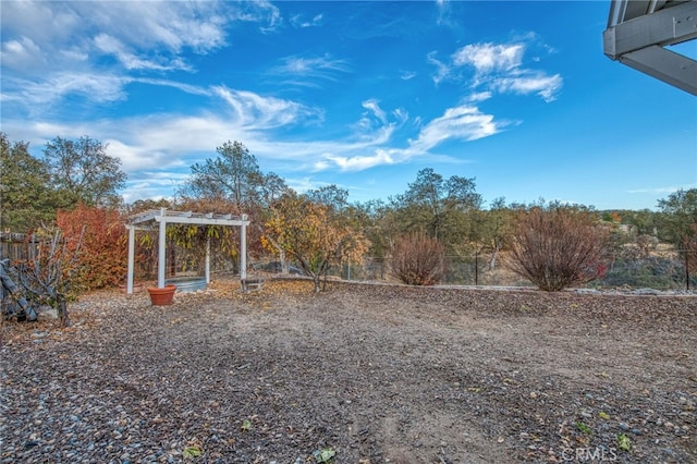 view of yard with a pergola