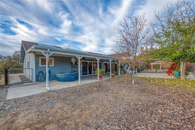 rear view of property with a patio