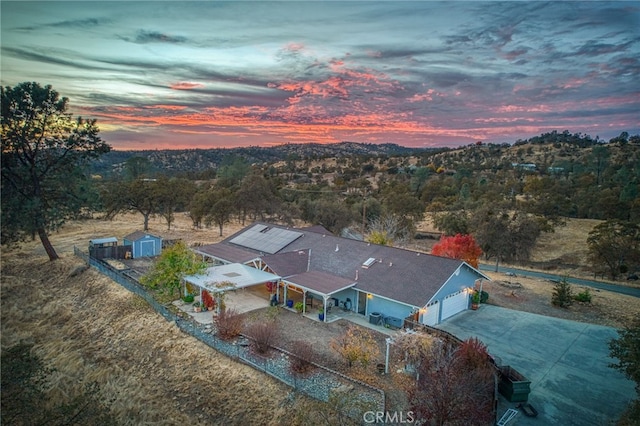 view of aerial view at dusk