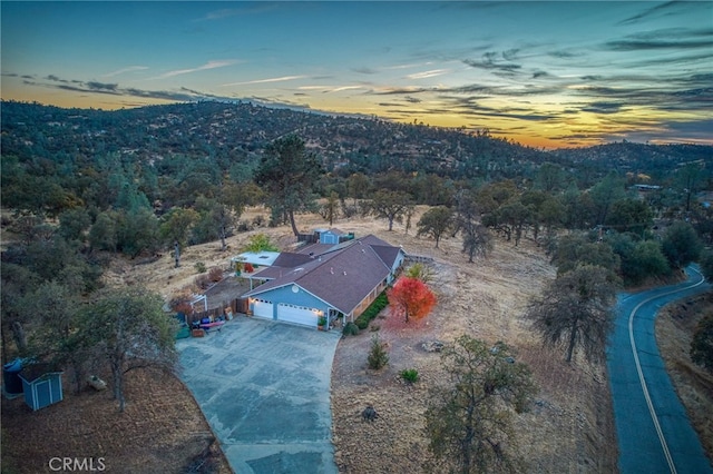 view of aerial view at dusk