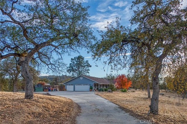 ranch-style house featuring a garage