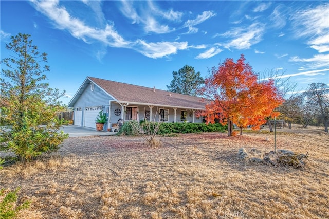 single story home featuring a garage