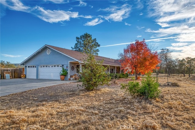 ranch-style home with a garage