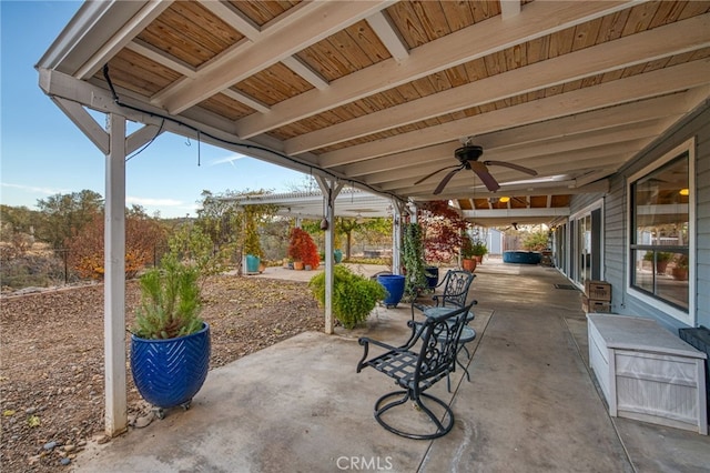 view of patio / terrace featuring ceiling fan