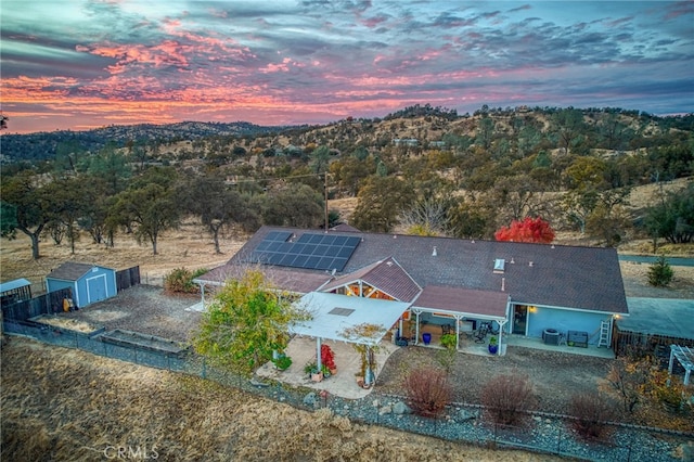 view of aerial view at dusk