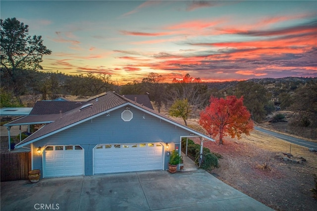 view of front of home with a garage