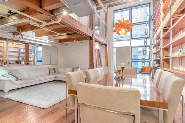 dining area featuring wood-type flooring