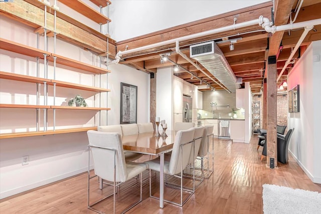 dining room featuring light wood-type flooring