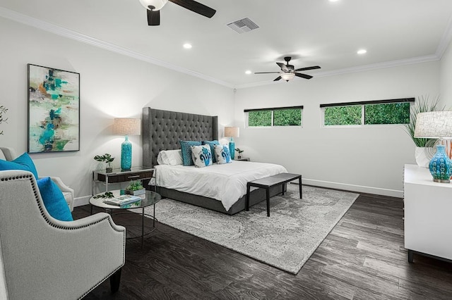 bedroom with dark hardwood / wood-style floors, ceiling fan, and crown molding