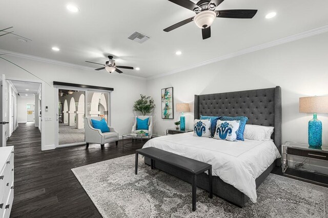 bedroom featuring ceiling fan, crown molding, and dark wood-type flooring