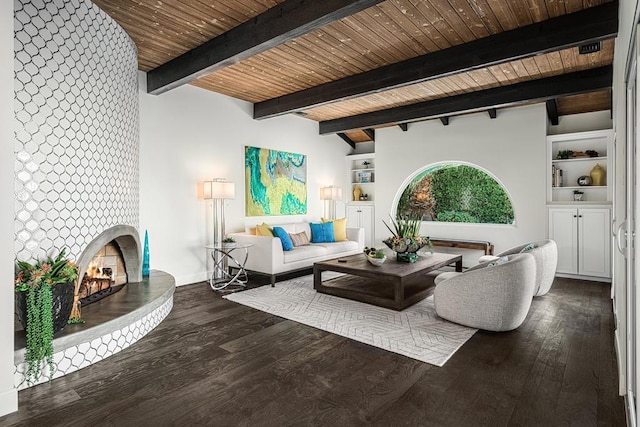 living room featuring a tiled fireplace, wooden ceiling, wood-type flooring, and vaulted ceiling with beams