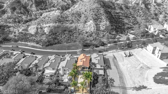 birds eye view of property with a residential view