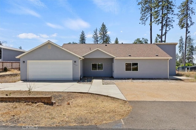 single story home featuring a garage